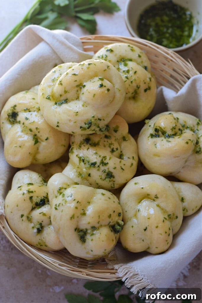 How to Make Homemade Garlic Knots: Soft, Chewy & Flavorful 15 Garlic knots in a basket.