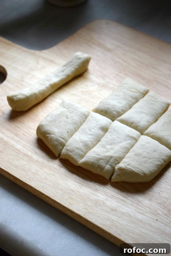 How to Make Homemade Garlic Knots: Soft, Chewy & Flavorful 9 Making garlic knots.