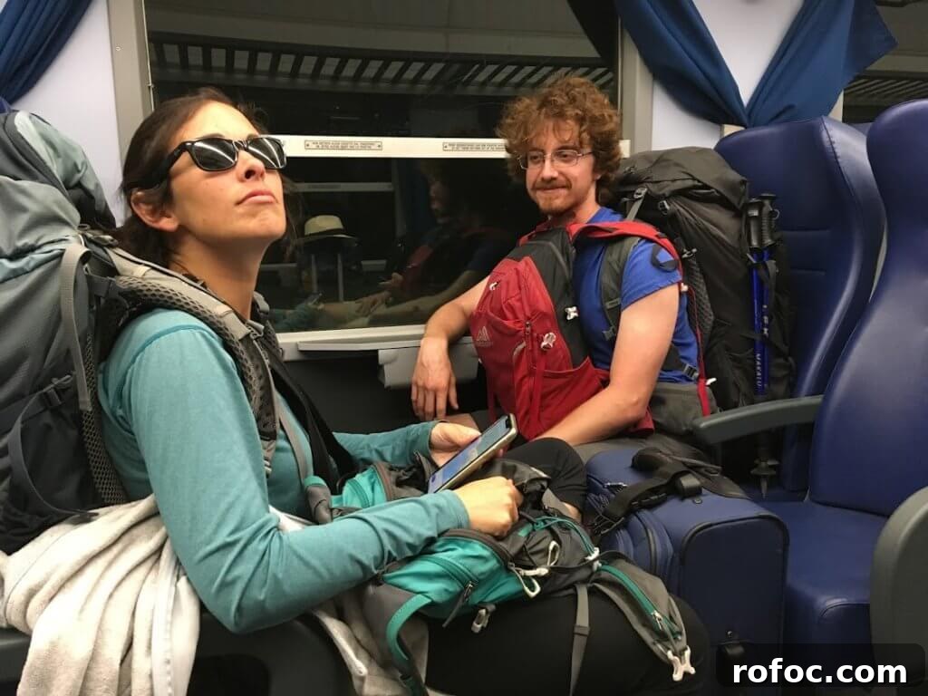 Jen and Dylan with backpacks on trip