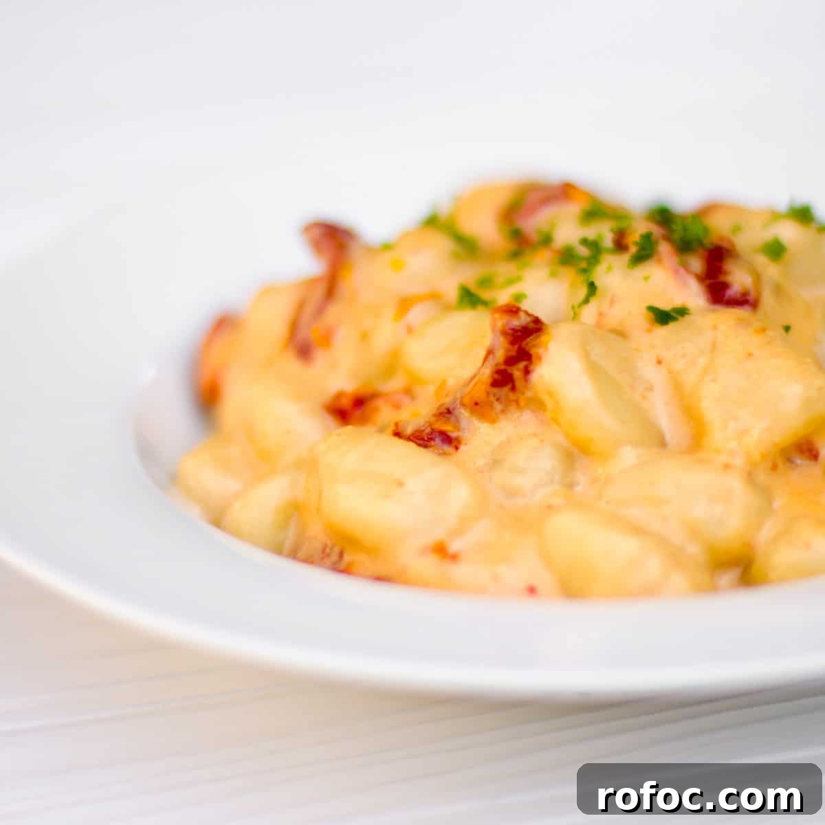 Sun-Dried Tomato Cream Gnocchi Recipe for Rich, Savory Flavor 3 Close up picture of a plate of gnocchi.