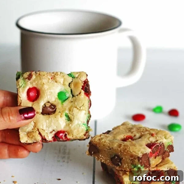 Magical Elf Donuts: Festive Donut Recipes & Decorating Ideas 11 Cookie Bars on table next to a white mug