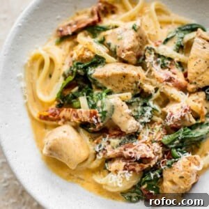 Creamy Tuscan Chicken Pasta: Garlic Parmesan Skillet Recipe 8 This creamy Tuscan chicken pasta recipe is even better than the Olive Garden's! You can quickly make this easy chicken, spinach, and sun-dried tomato pasta with a creamy garlic sauce at home in under half an hour!