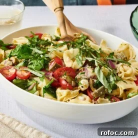 Tortellini Pasta Salad in white serving bowl.