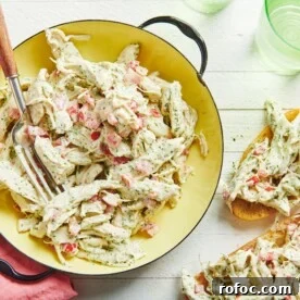Herbed Chicken Salad in yellow bowl and on toasted bread.