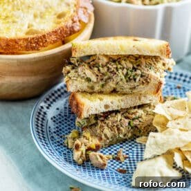 Italian tuna salad sandwiches on plate.