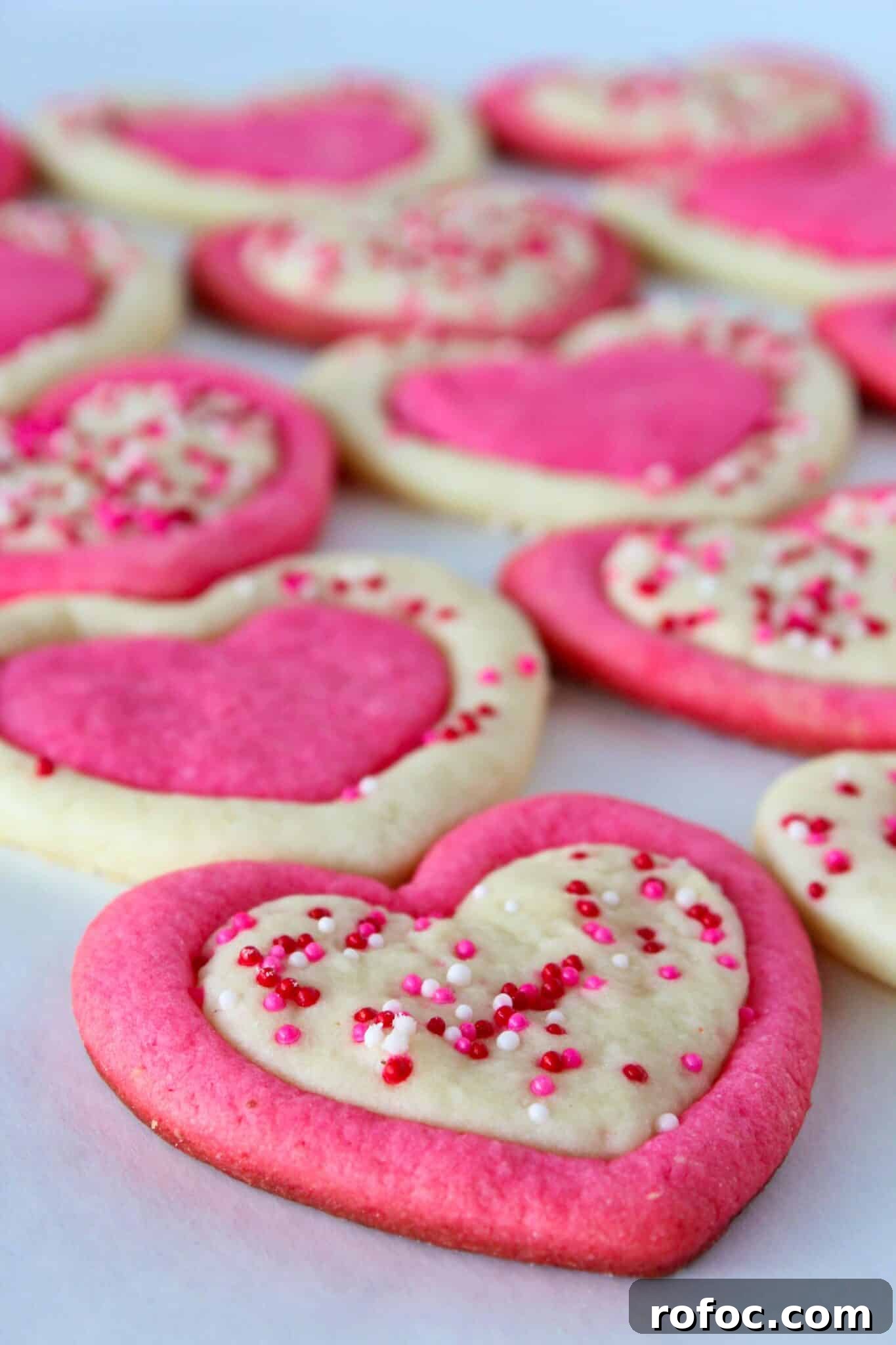 Valentine’s Day Sugar Cookie Recipe: Soft Heart Cookies Tutorial 2 Easy Valentine's Day Sugar Cookies featured by top US cookie blog, Practically Homemade