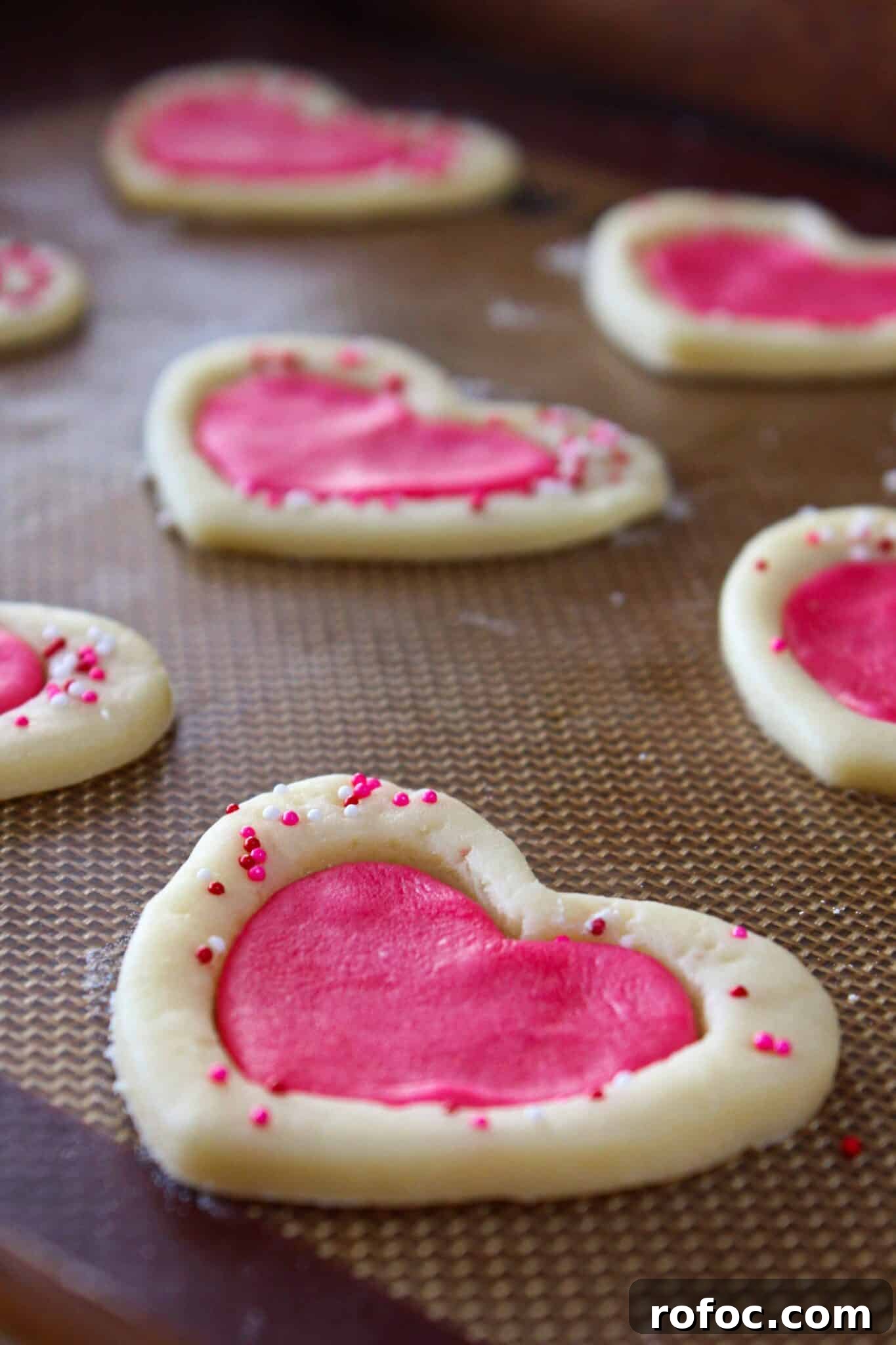 Valentine’s Day Sugar Cookie Recipe: Soft Heart Cookies Tutorial 12 Easy Valentine's Day Sugar Cookies featured by top US cookie blog, Practically Homemade