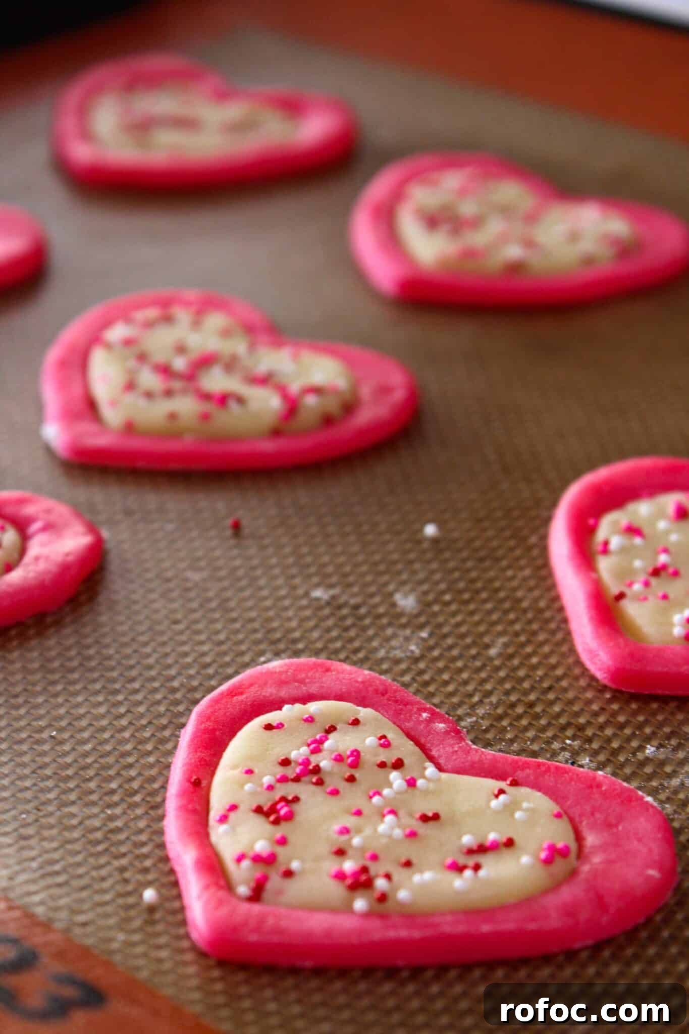 Valentine’s Day Sugar Cookie Recipe: Soft Heart Cookies Tutorial 13 Easy Valentine's Day Sugar Cookies featured by top US cookie blog, Practically Homemade