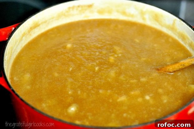 Cooking apple butter Apple butter cooking in saucepan