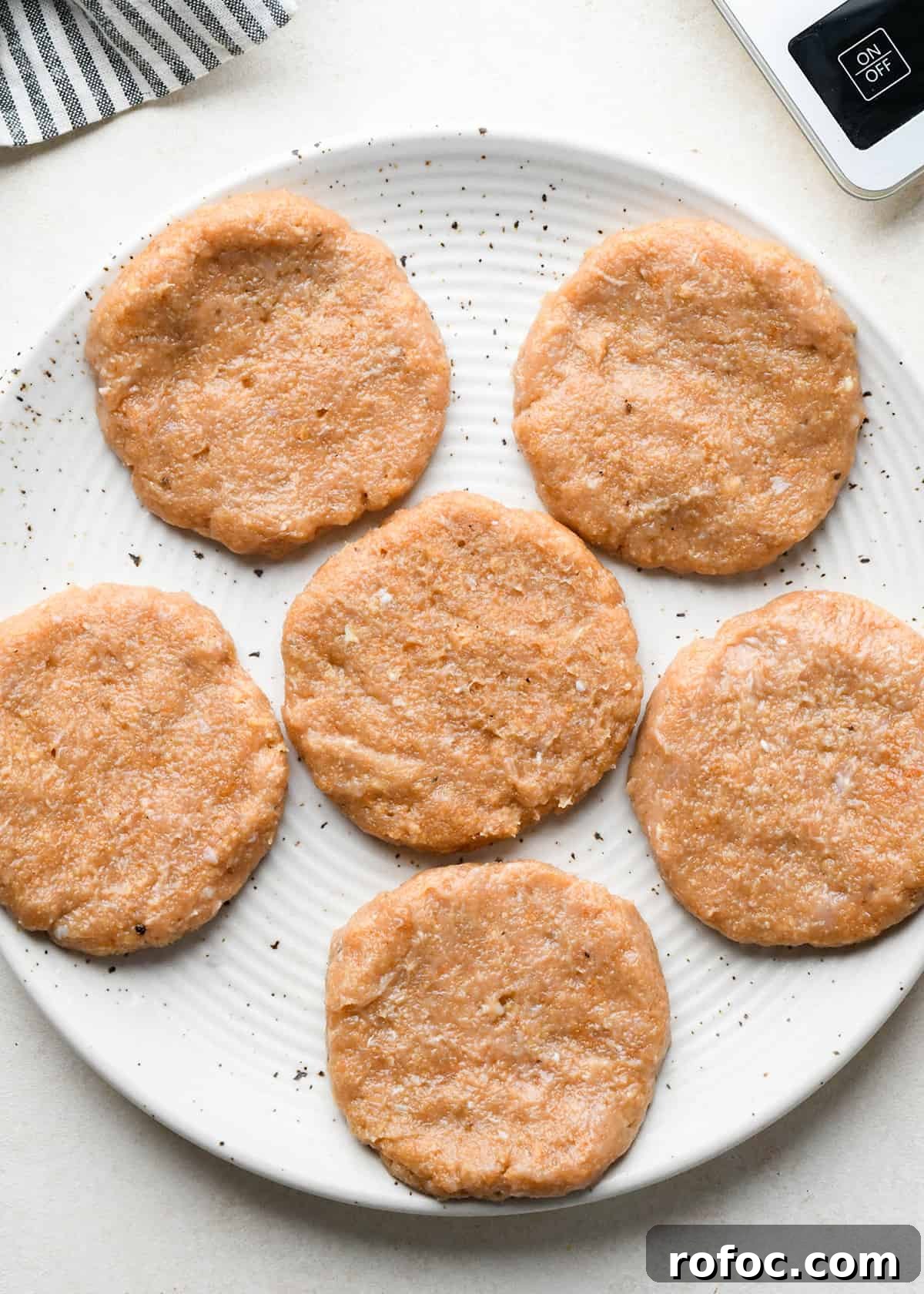 Juicy Turkey Burger Recipes for Flavorful Weeknight Meals 8 6 Turkey Burger patties on a plate before cooking