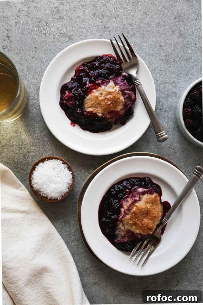 two plates of gluten free blackberry cobbler