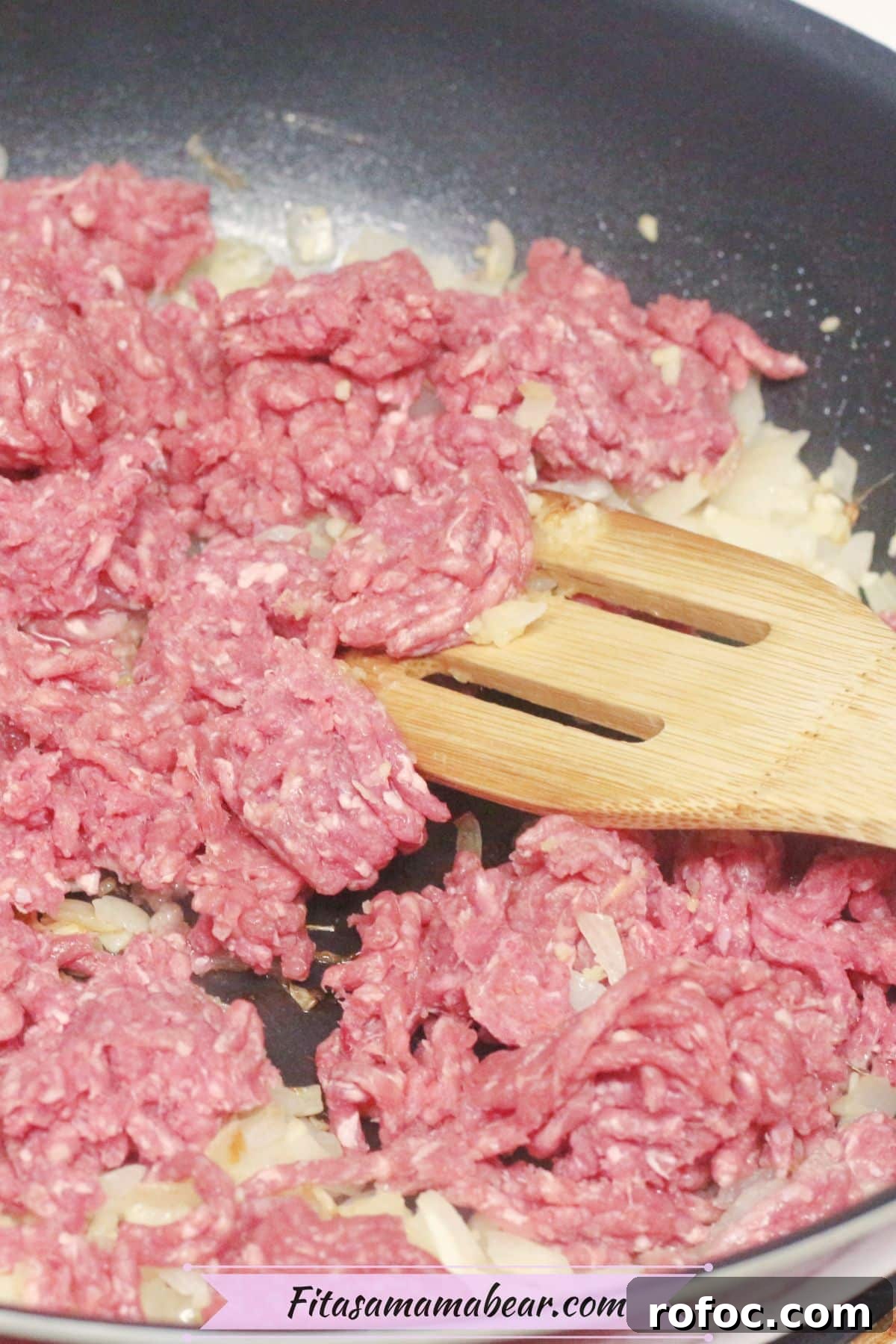 Gluten-Free Inside-Out Egg Roll Recipe for Crispy Flavor 5 Ground beef and onions in a skillet.