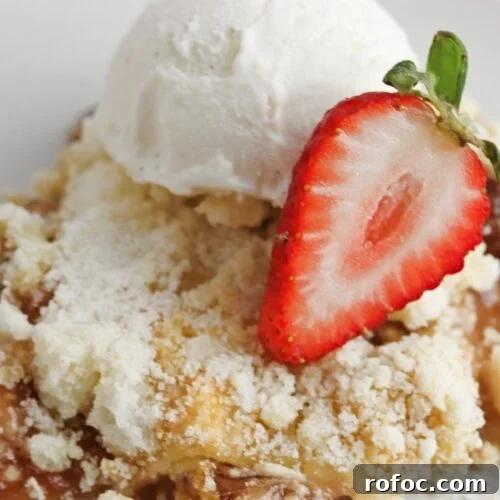 Strawberry cheesecake dump cake combines the fruity sweetness of strawberries with the creamy richness of cheesecake and the buttery crunch of cake mix.