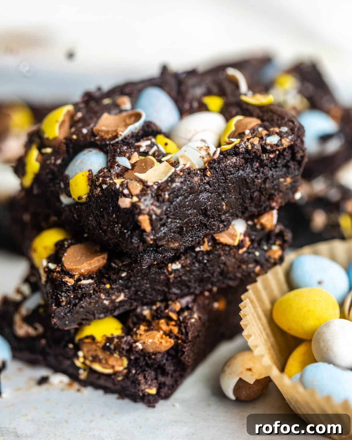 Fudgy Mini Egg Brownies Recipe — Bite-Sized Chocolate Treats 5 stacked brownies