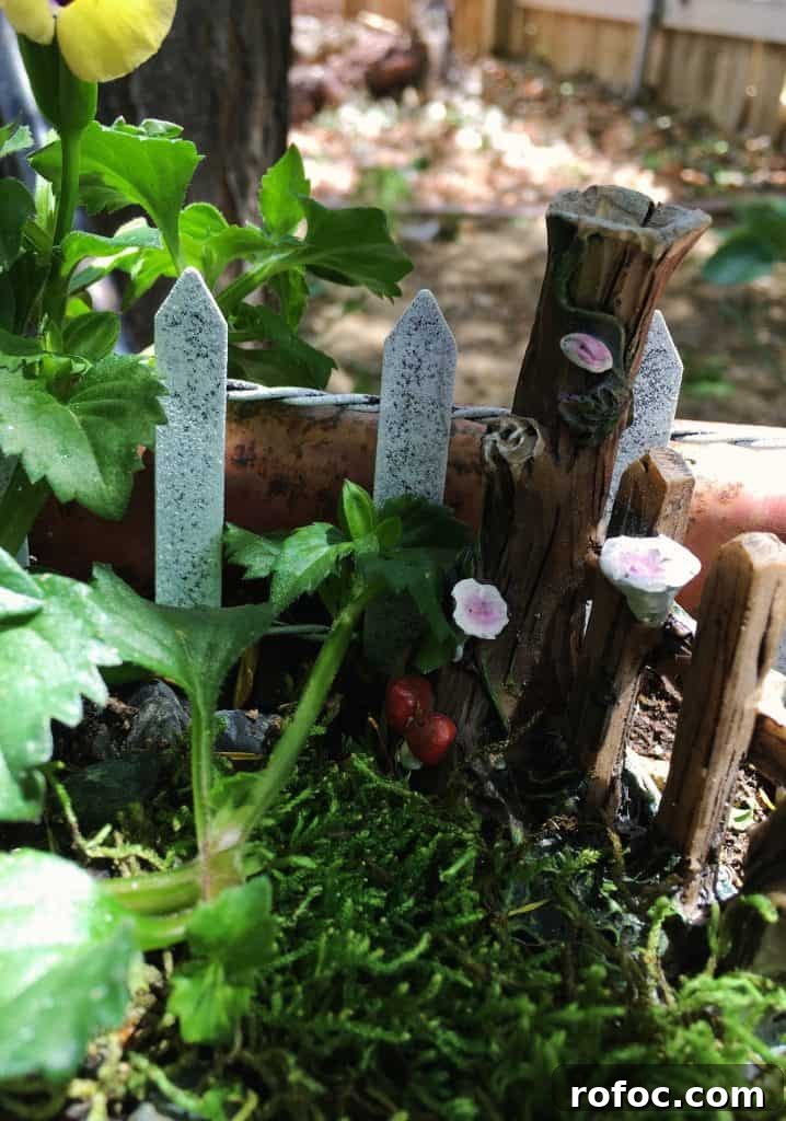 How to Build a Charming DIY Fairy Garden in Your Yard 6 Fairy Garden Fence