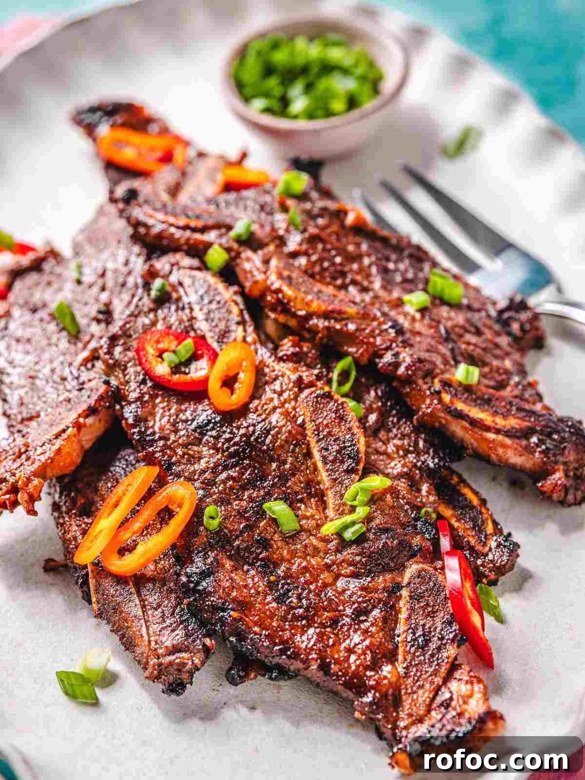 How to Cook Flanken-Style Beef Short Ribs: Recipe & Tips 7 Seared beef on a plate.