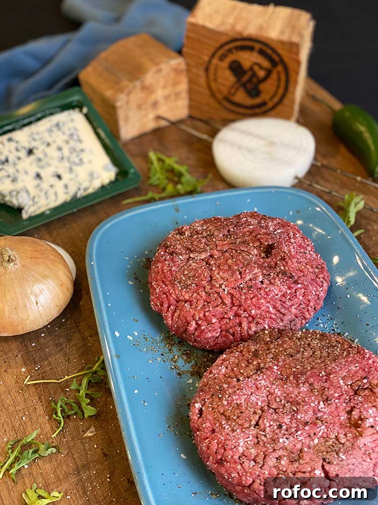 How to Smoke Juicy Hamburgers on a Grill or Smoker 3 Seasoned hamburger patties ready for the grill