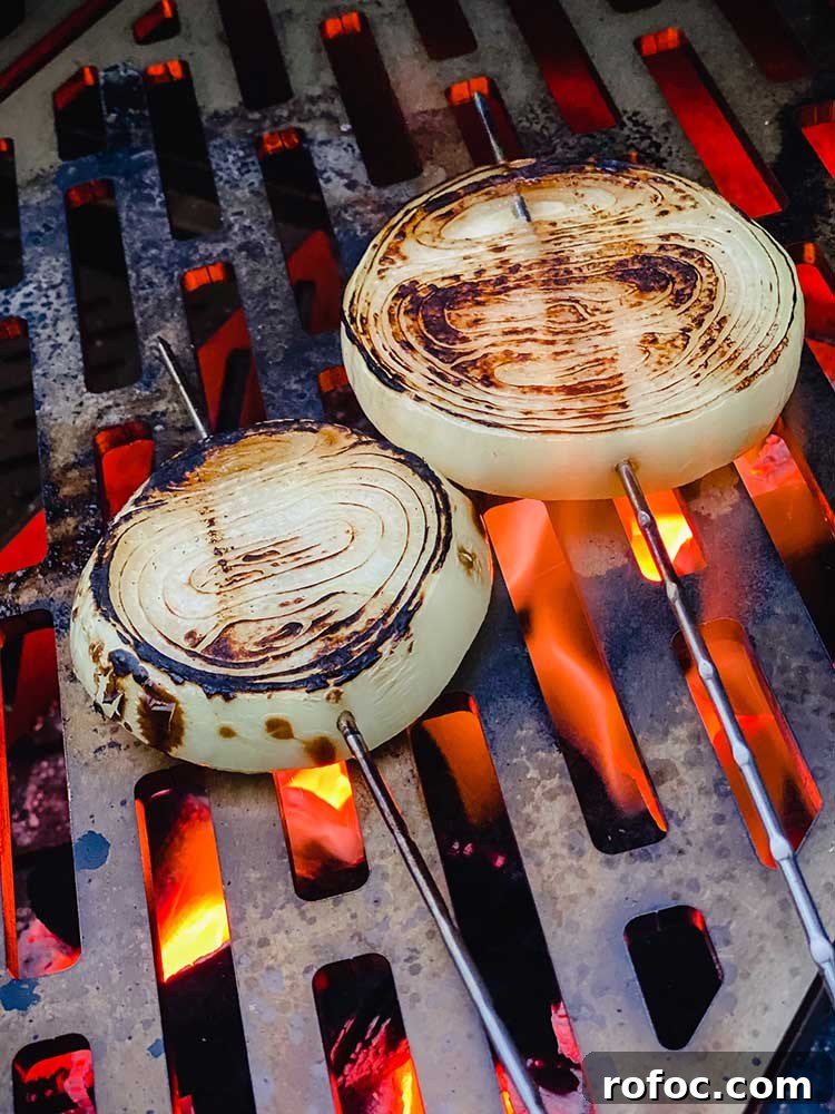 How to Smoke Juicy Hamburgers on a Grill or Smoker 6 skewered onions on a high flame grill