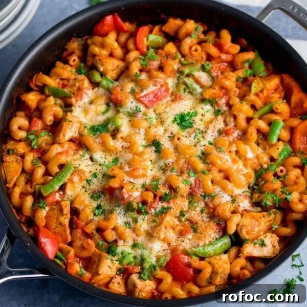 One-Pot Chicken Rigatoni Alfredo Recipe for Creamy Weeknight Meals 9 Close up of pan of cheesy chicken pasta