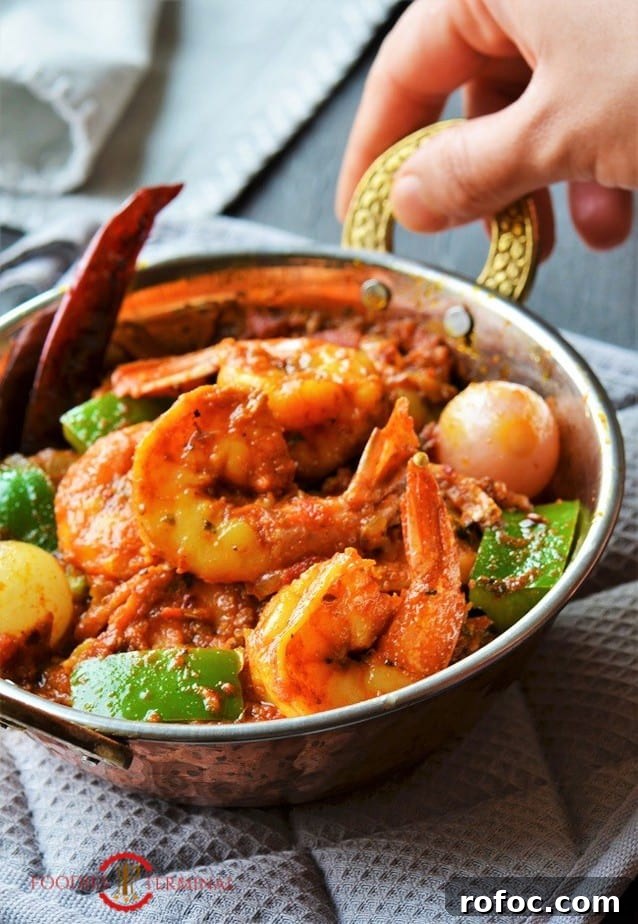 Kadai Prawns Recipe: Spicy Indian-Style Prawns in Kadai Sauce 8 Prawn Karahi in a copper Karahi with brass handles