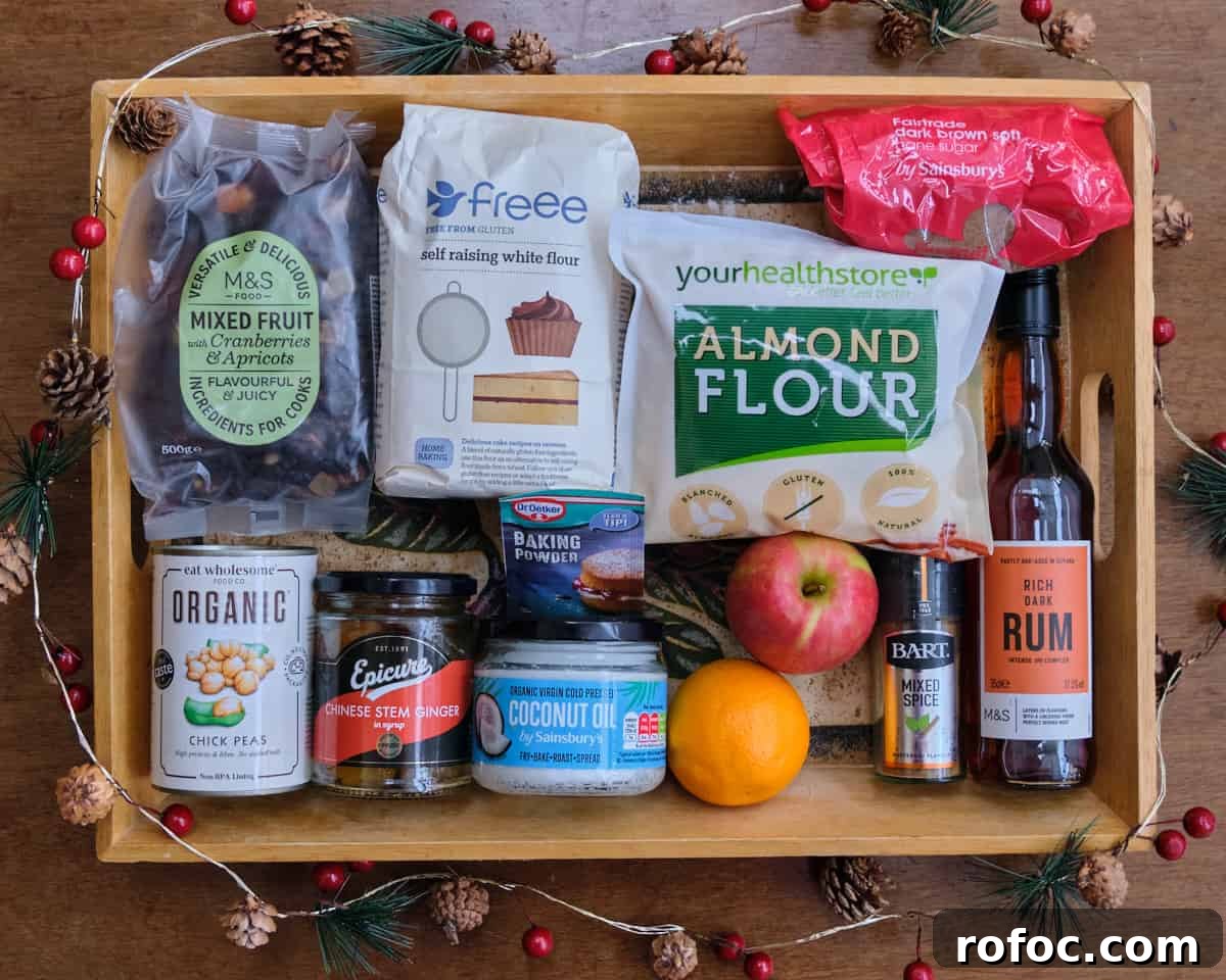 Photo of the ingredients to make christmas pudding laid out in a tray.