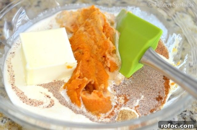 Pumpkin Caramels with Butter and Cream | fifteenspatulas.com pumpkin spice, puree, butter, and cream added to caramel mixture