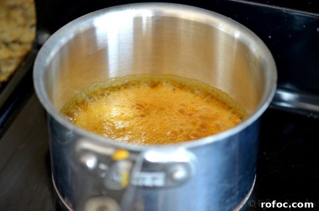 Pumpkin Spice Caramels Recipe | fifteenspatulas.com Pumpkin spice caramel in saucepan