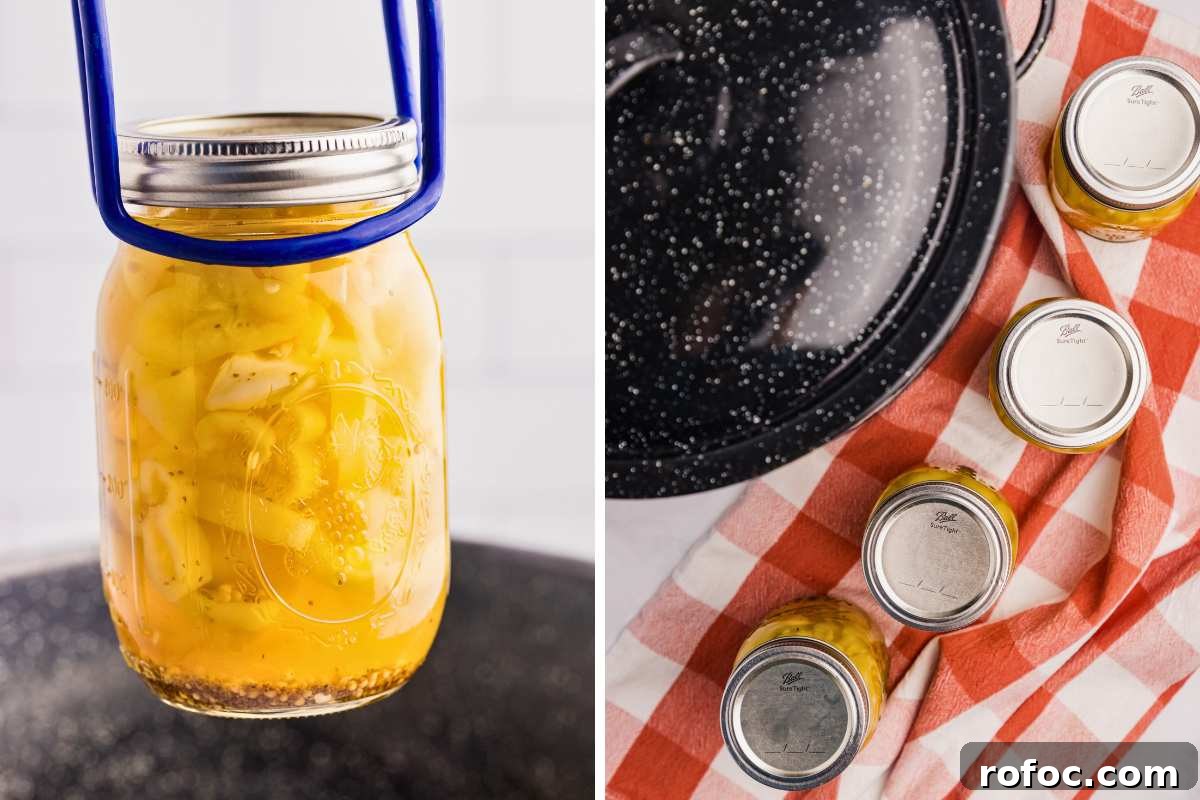 How to Can Homemade Pickled Banana Peppers for Long-Term Storage 8 jar lifted out of canner and jars cooling on towel.