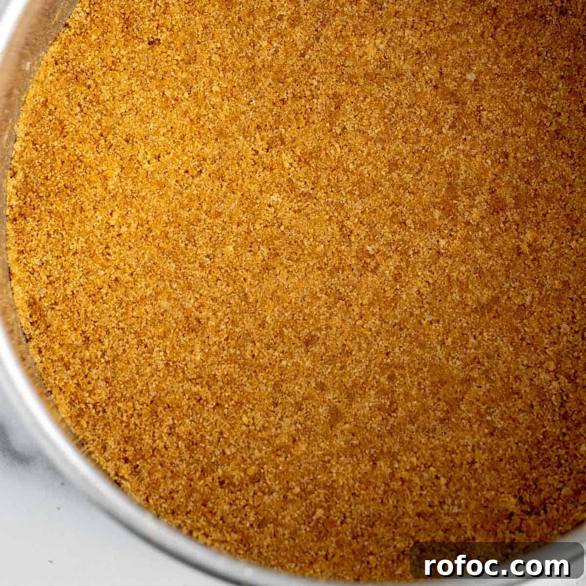 Decadent Cherry Cheesecake Recipe with a Buttery Crust 6 Graham cracker crumbs pressed into a cake pan.