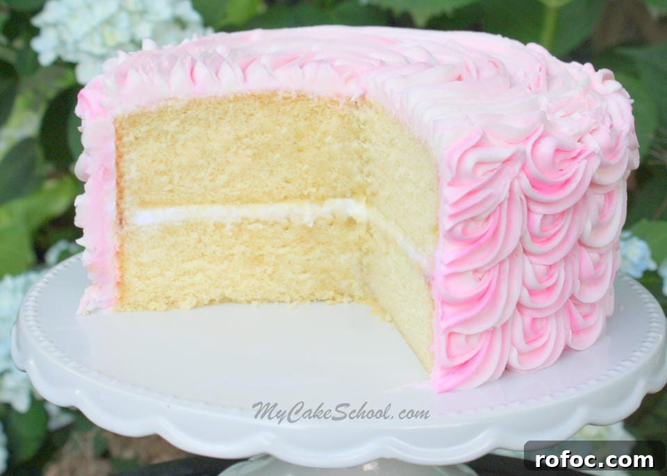 This delicious White Almond Sour Cream Cake Recipe is so moist and very easy to make! White Almond Sour Cream Cake- A Doctored Cake Mix Recipe