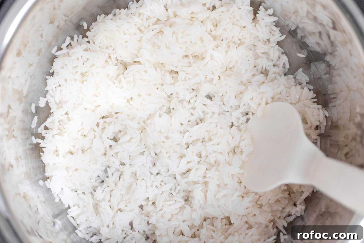 Perfect Jasmine Rice in the Instant Pot: Fluffy & Quick 7 Fluffed rice in Instant Pot liner.