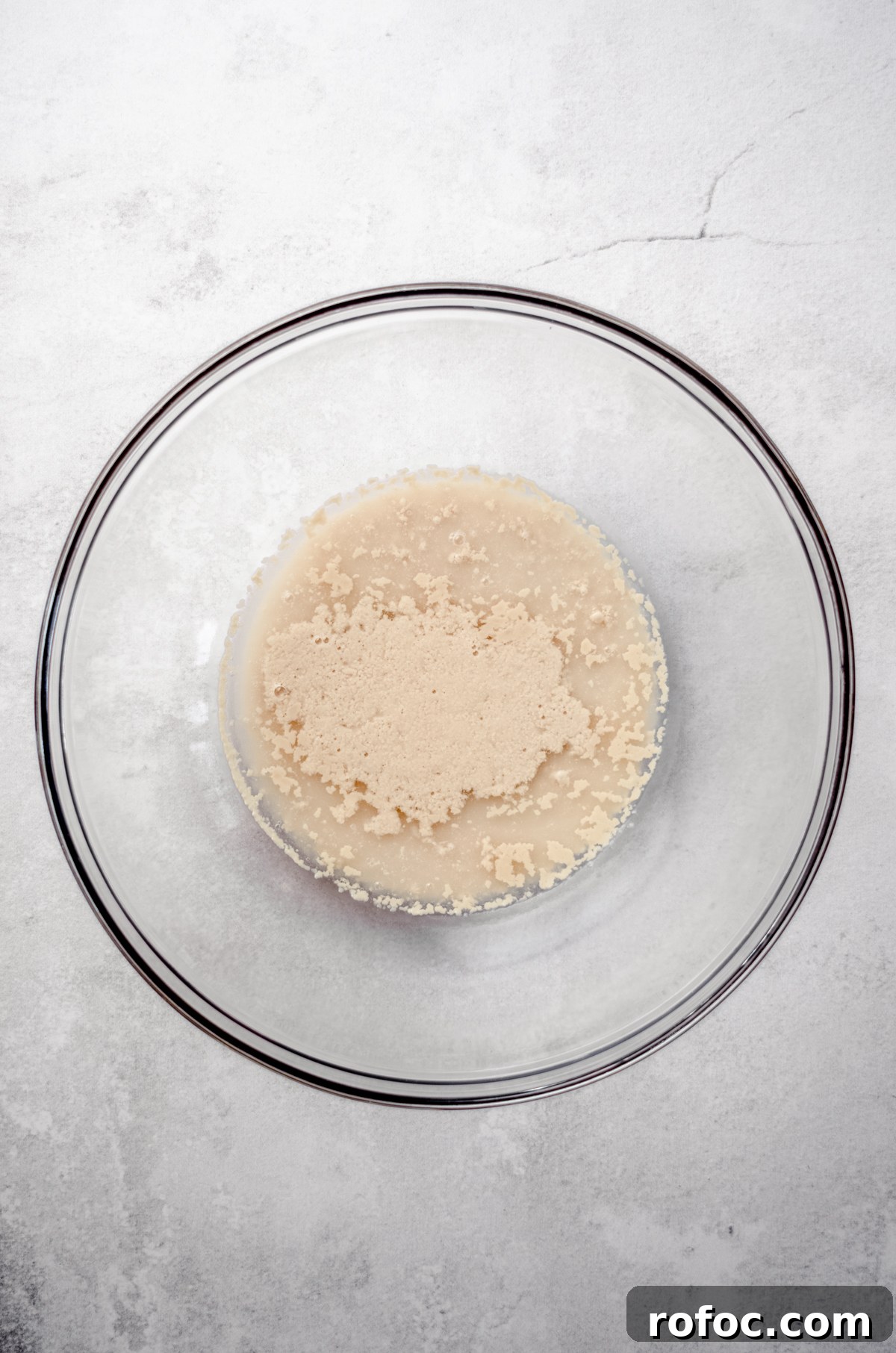 Baking with Yeast: A Practical Guide for Soft, Flavorful Bread 3 Aerial photo of proofed yeast in a large glass bowl.