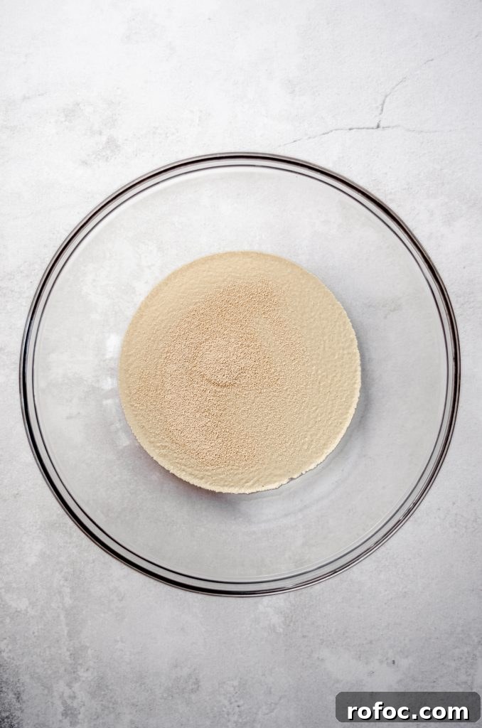 Baking with Yeast: A Practical Guide for Soft, Flavorful Bread 4 Aerial photo of yeast in a large glass bowl before proofing.