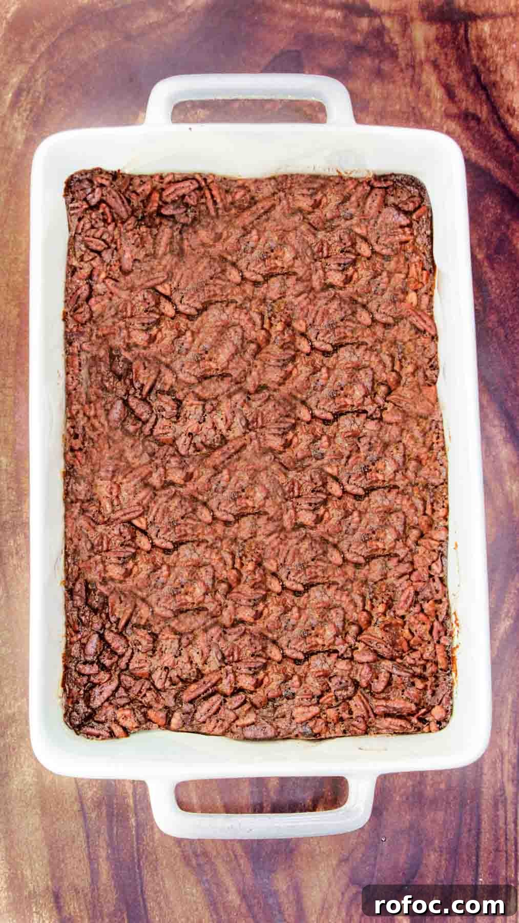 Derby Pie Brownies: Classic Kentucky Derby Dessert Recipe 11 Top down view of a freshly baked pan of Derby Pecan Pie Brownies pulled from the oven. Hostess At Heart