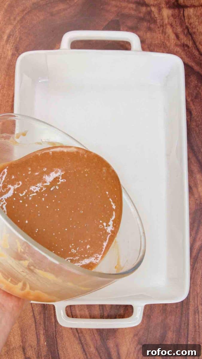 Derby Pie Brownies: Classic Kentucky Derby Dessert Recipe 6 Chocolate Brownie batter being poured into a baking dish - Hostess At Heart