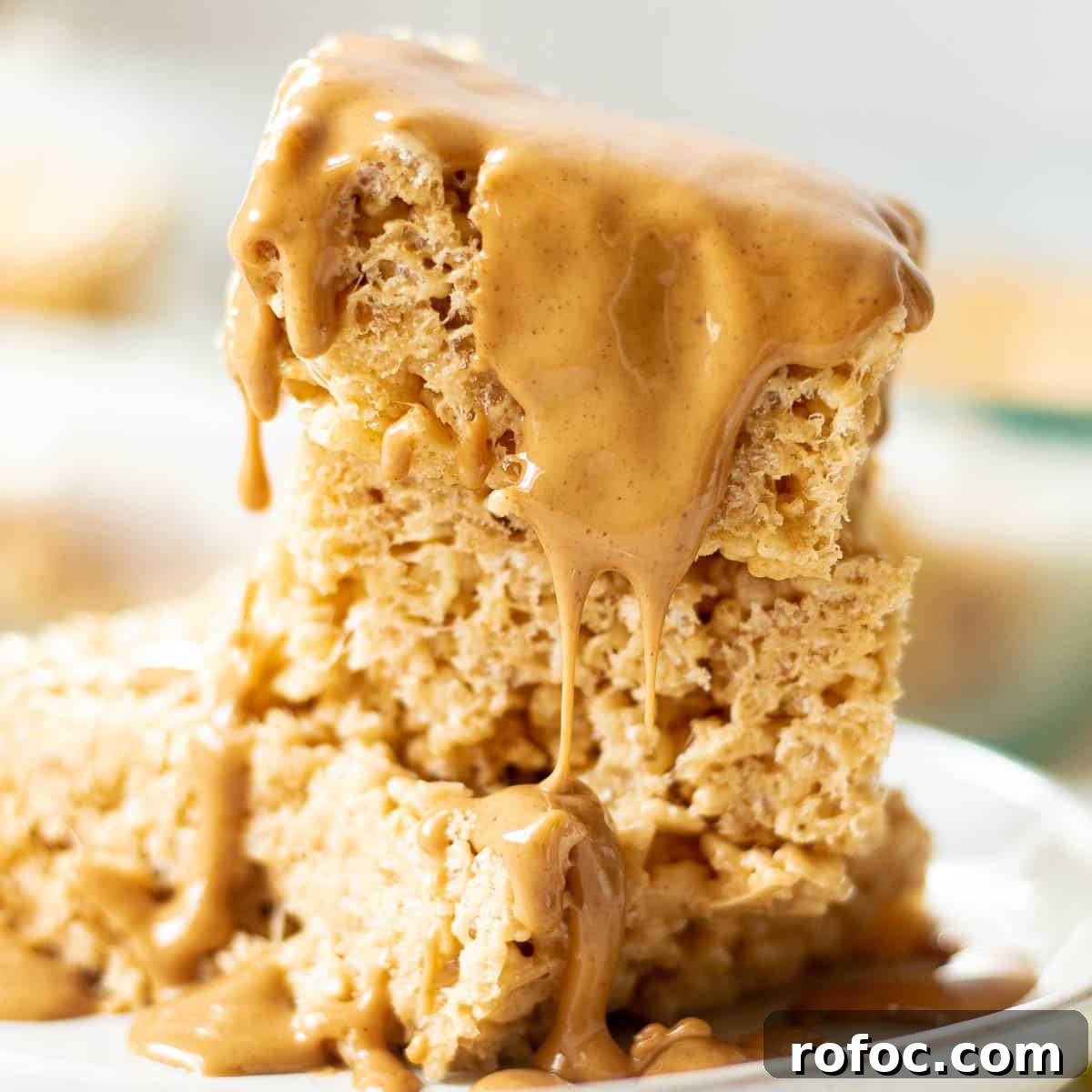 Peanut Butter Rice Krispie Treats Recipe You’ll Love 5 peanut butter rice krispie treats drizzled in peanut butter