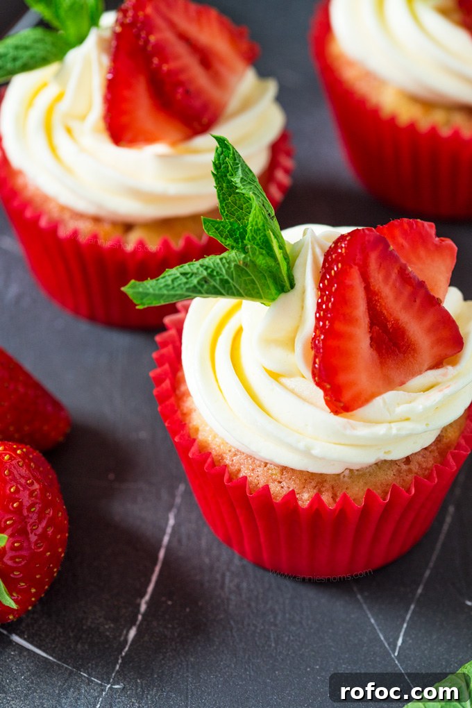 Strawberry Pimm’s Cupcakes with Fresh Berries and Mint 4 These Strawberry Pimms cupcakes are Wimbledon in cupcake form! Lemon and lime cupcakes with a pimms syrup and frosting. Sweet, light and so refreshing!