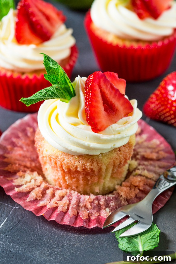 Strawberry Pimm’s Cupcakes with Fresh Berries and Mint 5 These Strawberry Pimms cupcakes are Wimbledon in cupcake form! Lemon and lime cupcakes with a pimms syrup and frosting. Sweet, light and so refreshing!