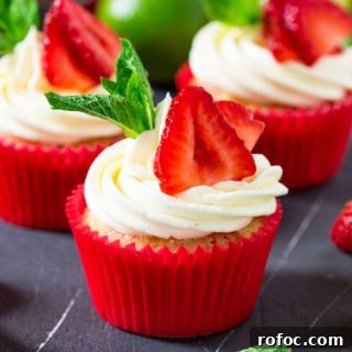 Strawberry Pimm’s Cupcakes with Fresh Berries and Mint 6 These Strawberry Pimms cupcakes are Wimbledon in cupcake form! Lemon and lime cupcakes with a pimms syrup and frosting. Sweet, light and so refreshing!