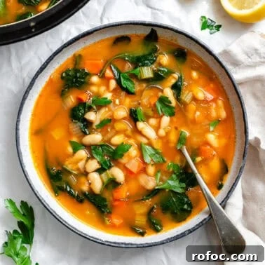 completed Tuscan White Bean Soup [With Kale] in a pot