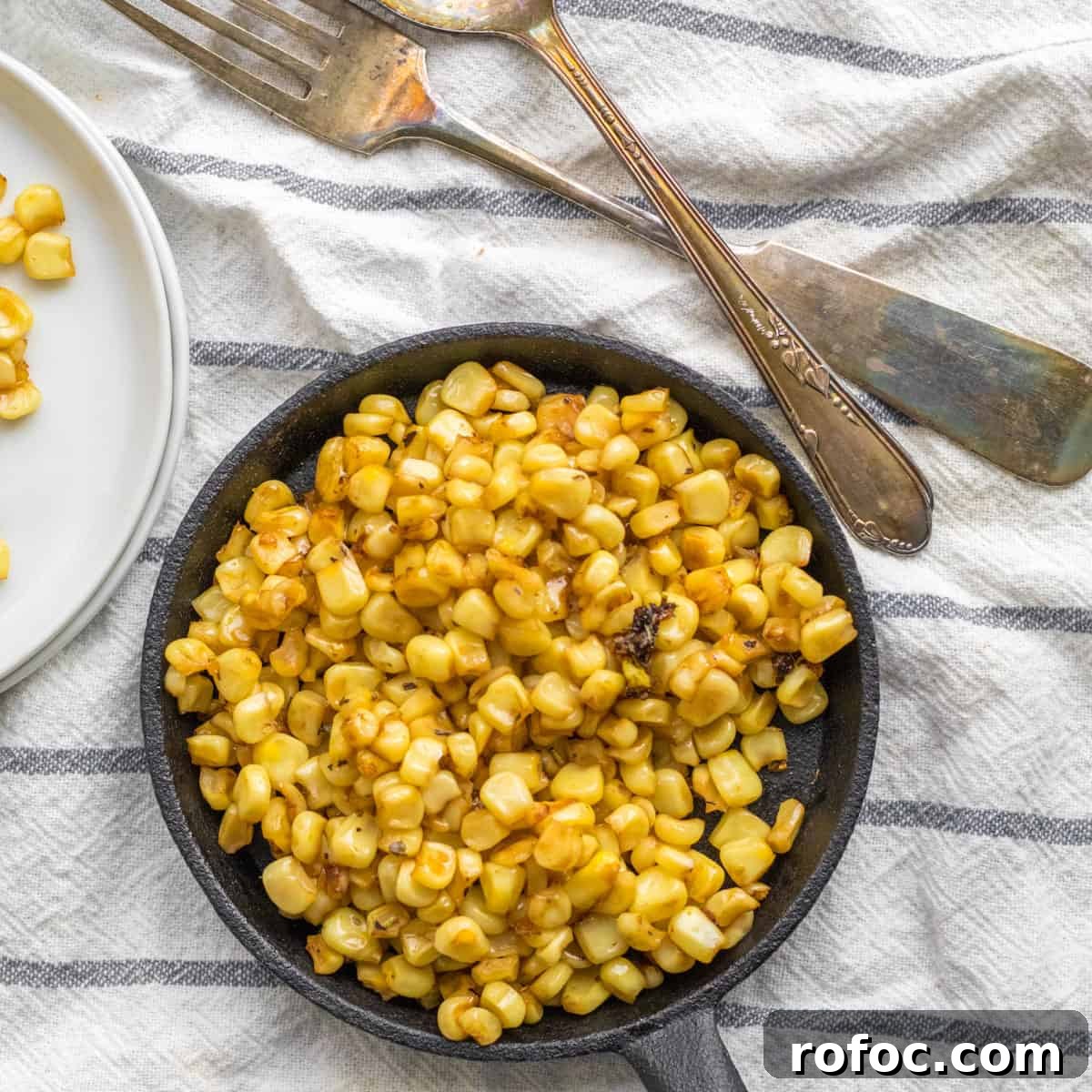 charred corn in a small skillet