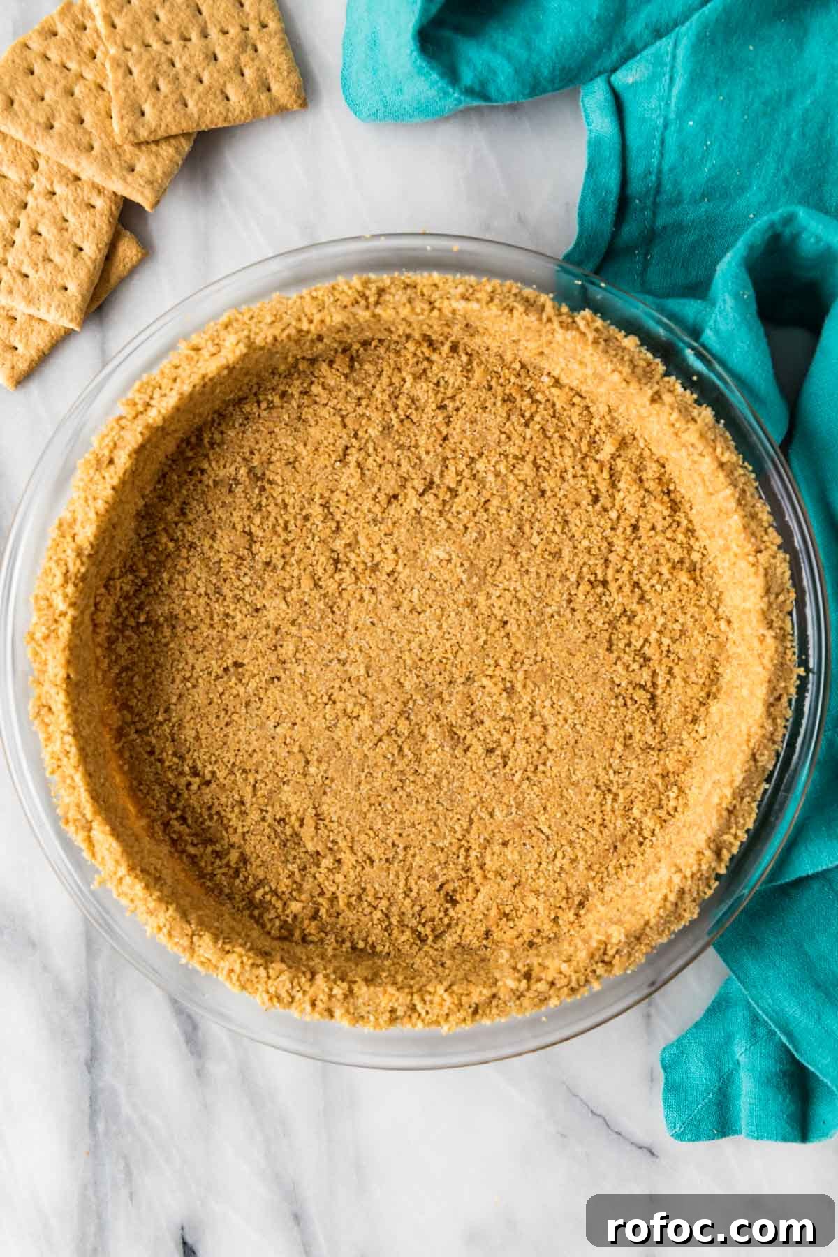 Graham Cracker Crust Recipe: Simple Steps for Perfect Pie Crust 2 Overhead view of a smooth crust made from a homemade graham cracker crust recipe.