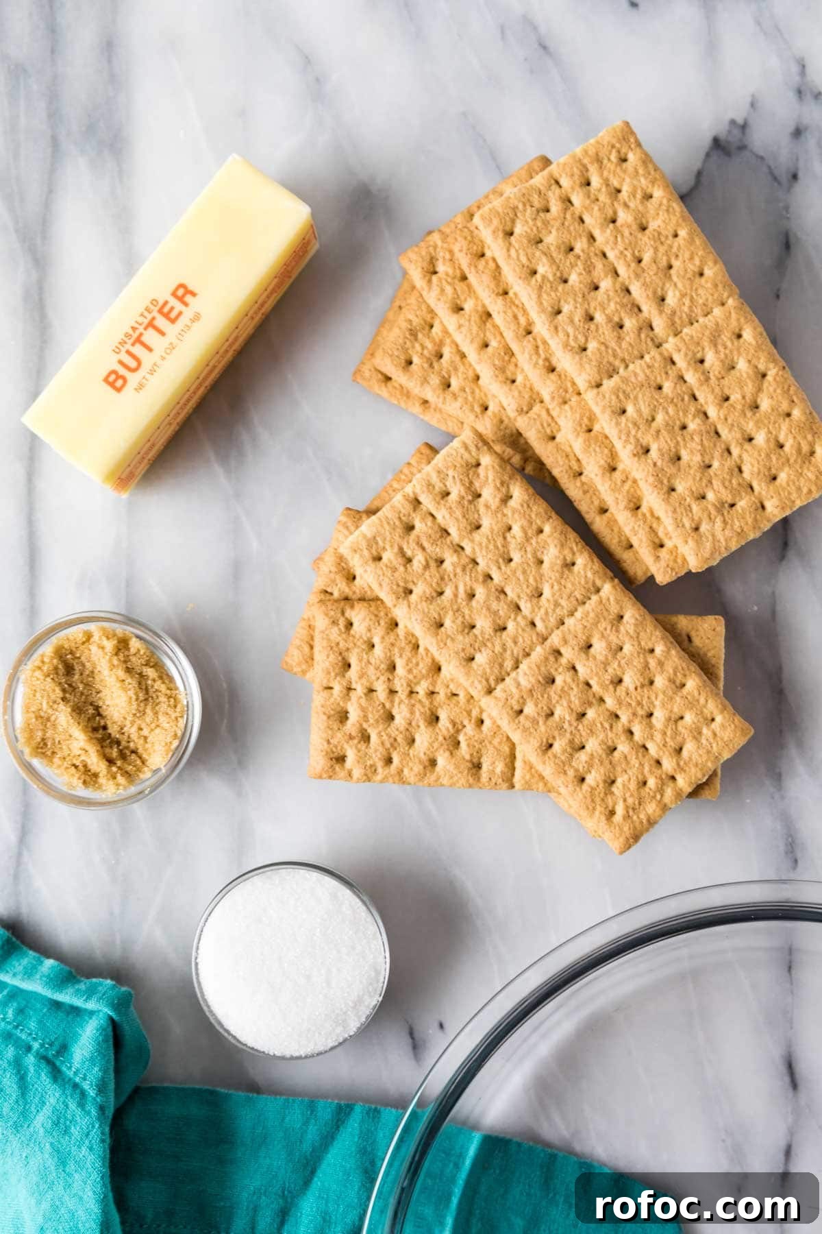Graham Cracker Crust Recipe: Simple Steps for Perfect Pie Crust 3 Overhead view of ingredients including graham cracker sheets, butter, brown sugar, and granulated sugar.