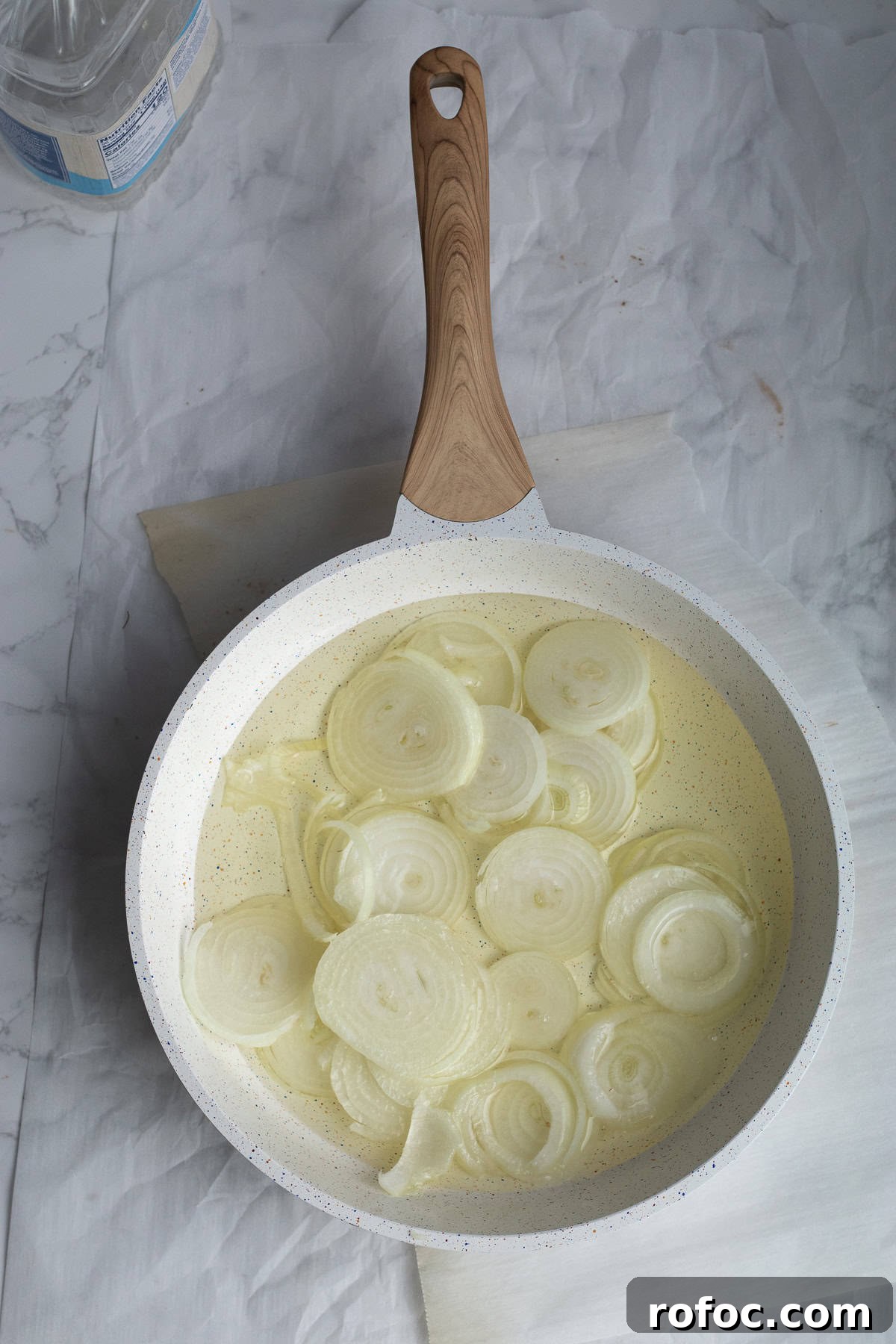 oil and onions in a frying pan