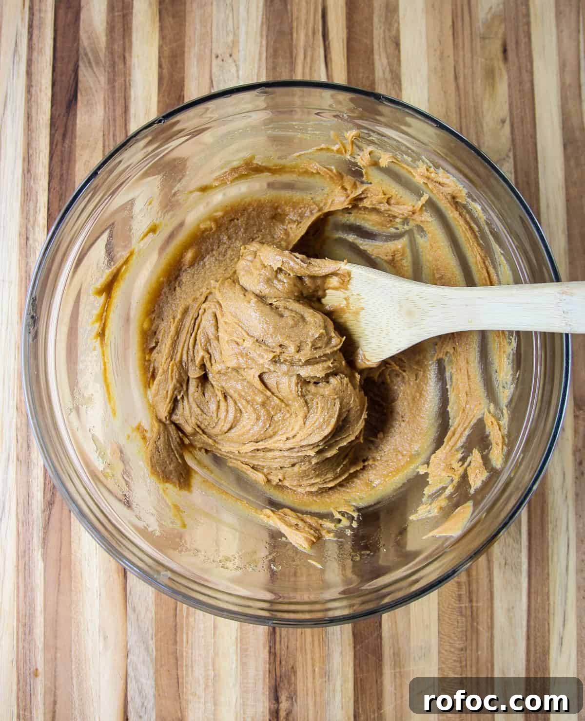 The ingredients combined in a glass mixing bowl.