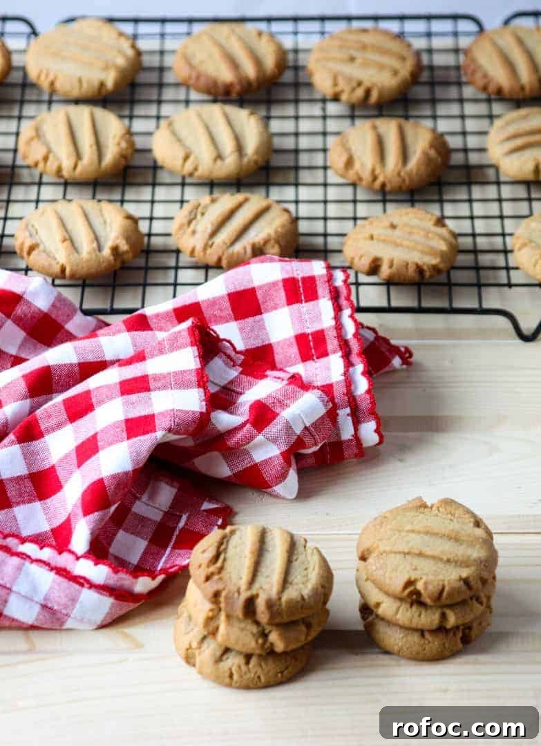 Stacks of gluten-free cookies on a table.