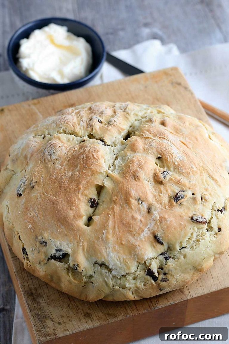 loaf of soda bread on a cutting board