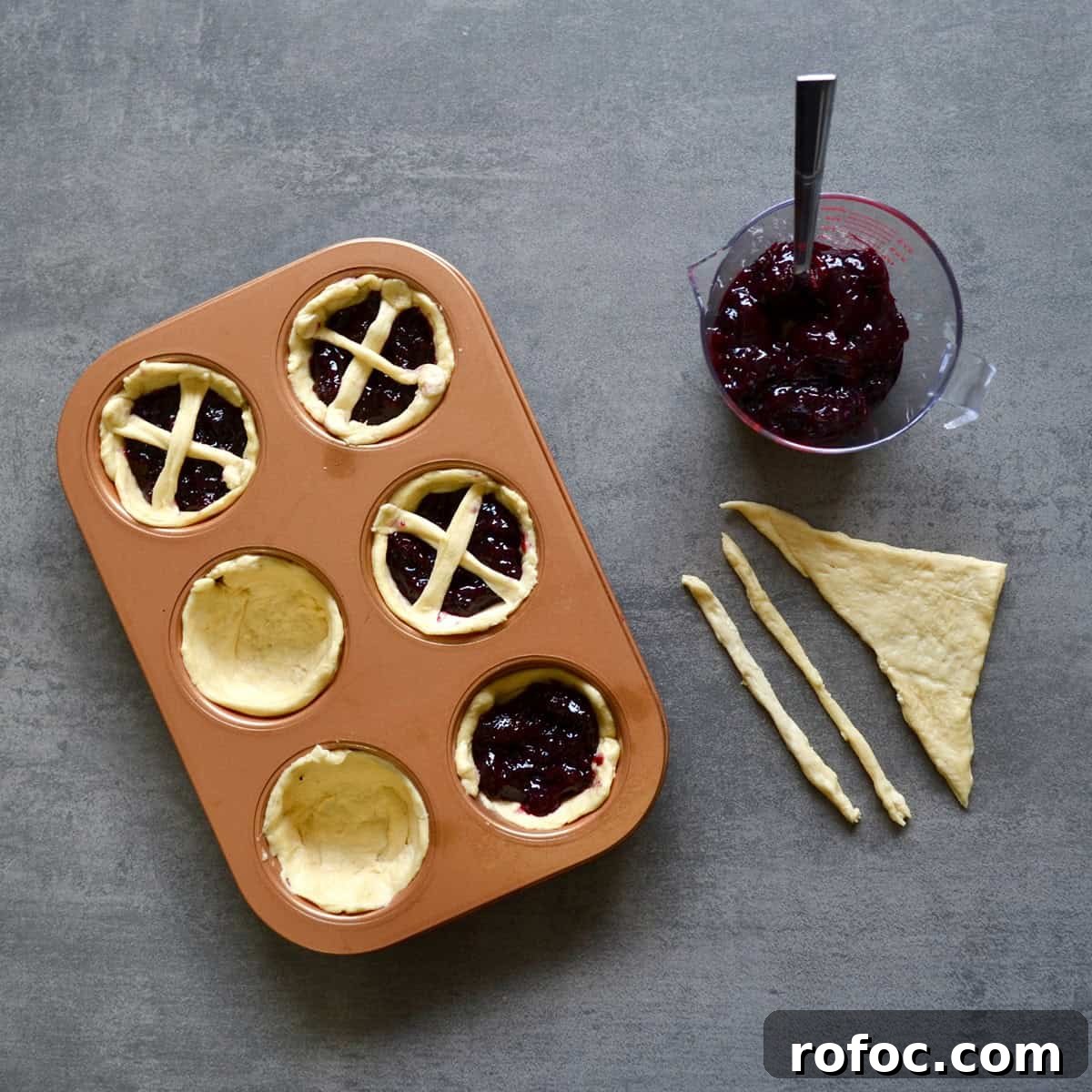 Low-Point Mini Cherry Pies - WW Points & Recipe 4 Assembling cherry pies in a muffin tin