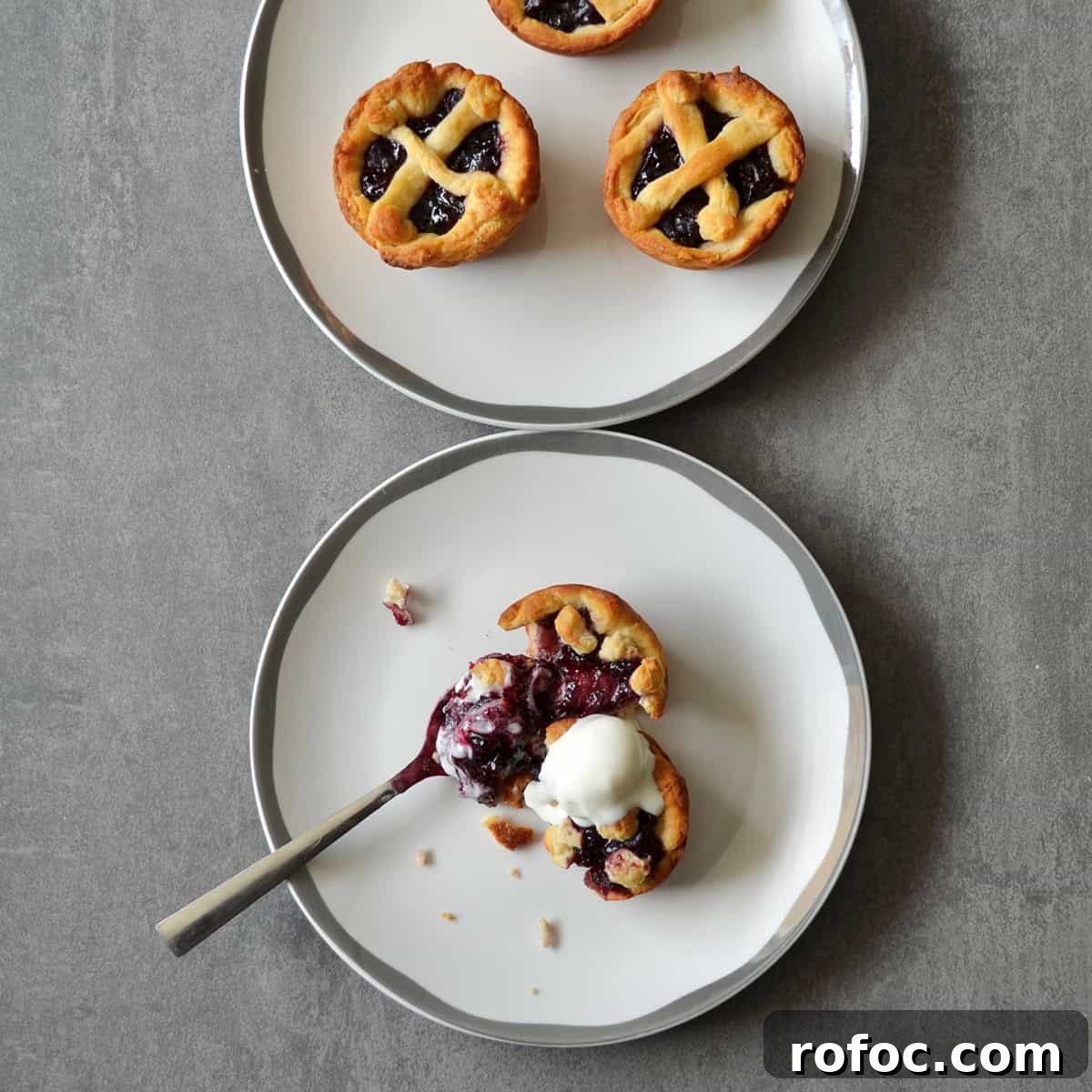 Low-Point Mini Cherry Pies - WW Points & Recipe 5 Cherry pies on plates