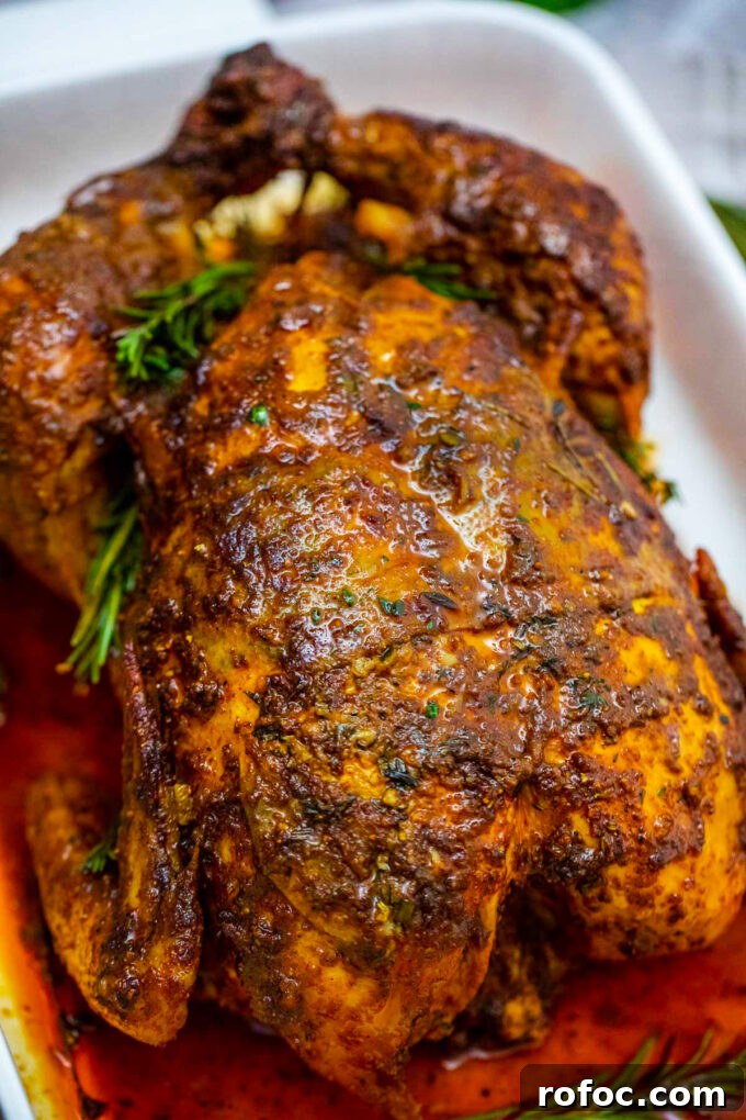 garlic herb butter roasted chicken with fresh rosemary.